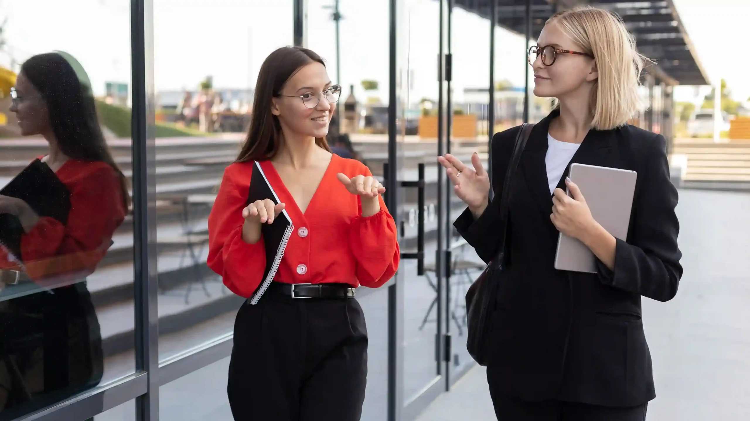 This professional image depicts two women walking near a modern commercial building as a certified visa and immigration consultant provides expert guidance on company formation in Latvia, highlighting a seamless integration of European business expansion and residency planning for international entrepreneurs. The consultation focuses on setting up a company in Latvia, including options for private limited liability (SIA) registration, EU VAT compliance, low corporate tax structures, and access to the broader European single market—ideal for digital nomads, freelancers, and global investors seeking an EU-based business presence. As part of a strategic Latvia business setup package, the consultant outlines pathways to obtain a Latvian entrepreneur visa, residence permit for business owners, and eventual eligibility for EU long-term residency or Schengen mobility rights. The advisory also covers minimum capital requirements, registered office solutions, local director mandates, and digital nomad visa integration—key components for non-EU nationals establishing a compliant and scalable entity. With growing interest in Baltic region incorporation, remote business ownership, and EU immigration through self-employment, Latvia has emerged as a smart alternative to more saturated markets, offering faster processing, lower costs, and strong digital infrastructure. This scene visually reinforces trust, professionalism, and tailored support for women entrepreneurs and foreign investors navigating cross-border company registration, visa-linked business formation, and EU relocation strategies—positioning the consultancy as a go-to expert for secure, approved, and end-to-end Latvia company setup services with integrated immigration outcomes.