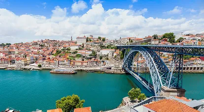 This captivating image showcases Portugal’s iconic bridge gracefully spanning a vast expanse of water, connecting two thriving cities and symbolizing opportunity, innovation, and seamless transition—powerfully mirroring the purpose and promise of the Portugal D2 Entrepreneur Visa. Designed for visionary international entrepreneurs, startup founders, and global investors, this visa pathway offers a strategic route to residence in Portugal through the establishment or scaling of a high-potential business venture in sectors such as technology, e-commerce, tourism, or renewable energy. The bridge represents the entrepreneurial journey from idea to execution, supported by expert guidance on D2 visa eligibility, business plan approval, Portuguese bank account setup, NHR tax regime benefits, and endorsement by AICEP or local incubators. With its low minimum investment threshold, fast processing times, and pathway to permanent residency and EU citizenship, the Portugal D2 Visa has emerged as one of the most attractive EU business immigration programs for non-EU nationals seeking lifestyle flexibility, Schengen Zone access, and long-term European residency. The scenic lake and urban skyline reflect Portugal’s high quality of life, digital infrastructure, and growing reputation as a hub for innovation and remote entrepreneurship. Perfectly aligned with commercial and transactional intent, this image appeals to ambitious business owners looking for visa-approved business projects, renewable residency permits, and EU market entry—positioning your consultancy as the trusted partner for end-to-end D2 visa services, from application to relocation, ensuring a smooth, compliant, and successful Portugal company setup and investor residency journey.